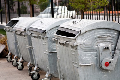 Electric waste collection van operating in Neasden streets